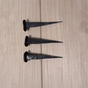 Decorative iron nail spikes